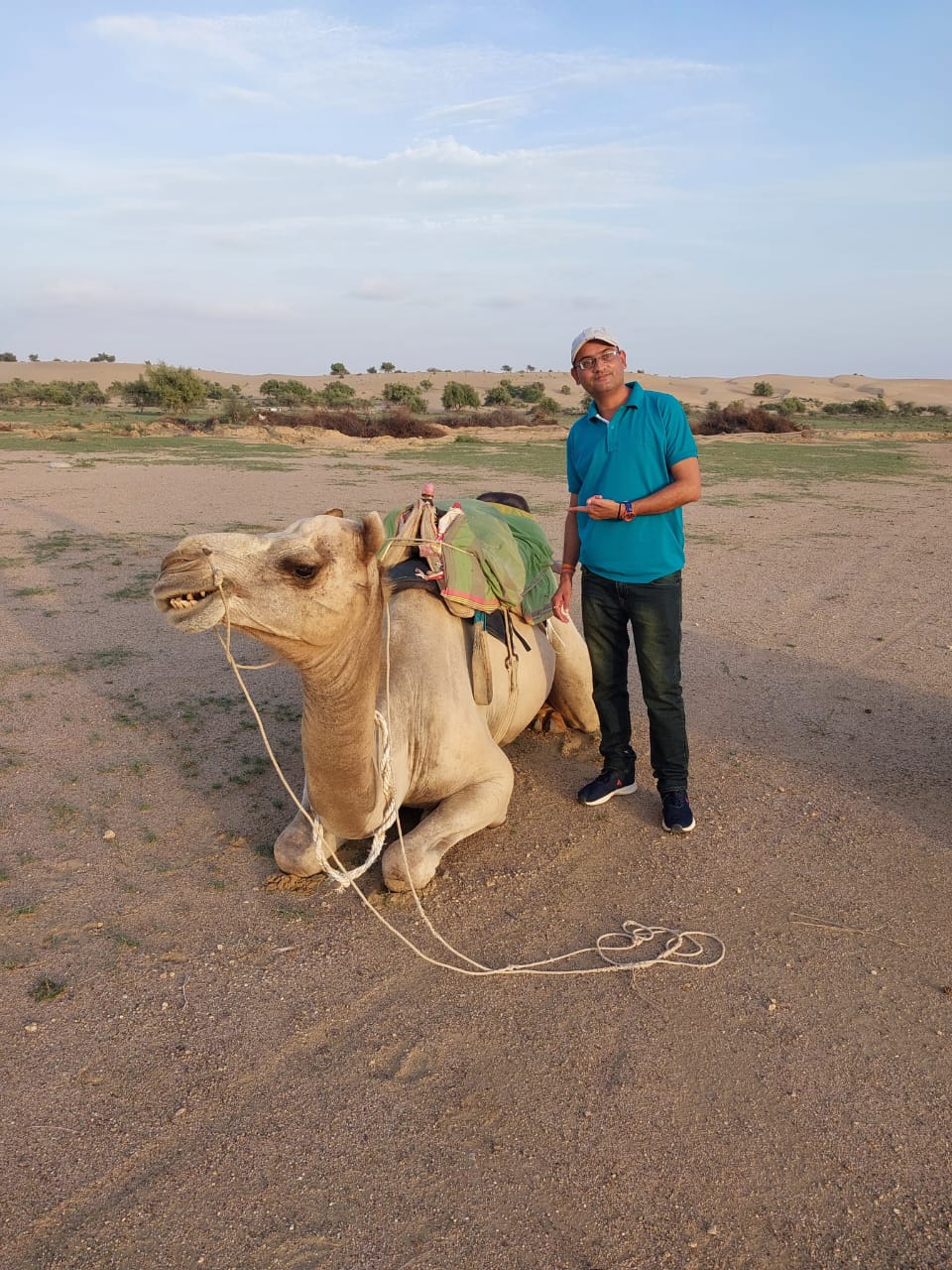 Harry with camel in the Thar Desert surroundings
